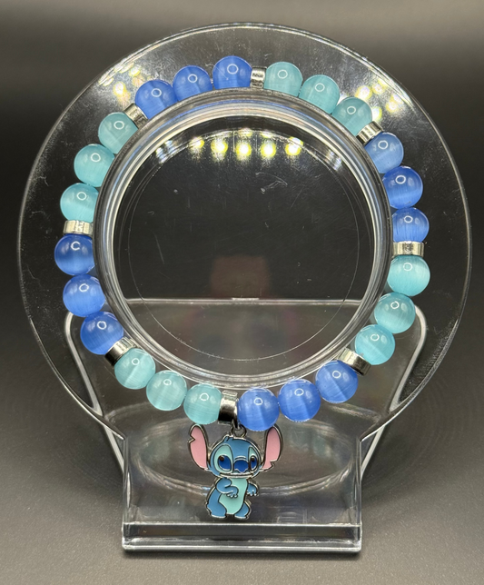 Blue and green beaded bracelet with a Stitch charm from Lilo & Stitch